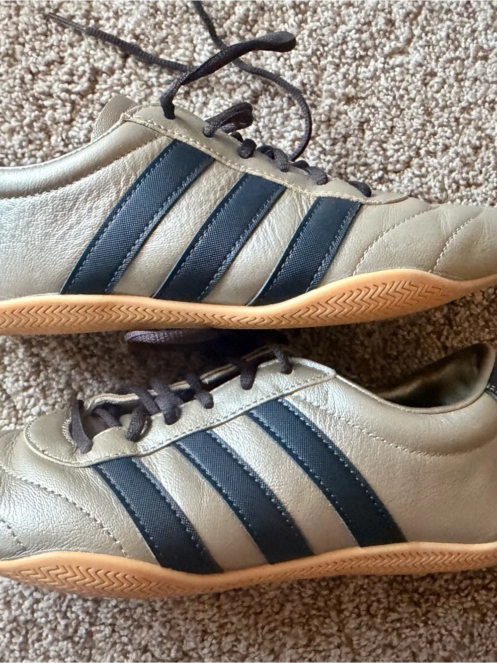 adidas  Metallic Gold Sneakers with Black Stripes